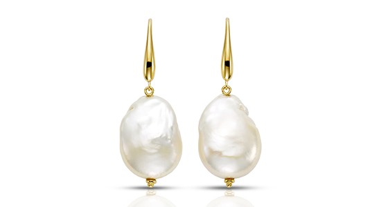 a pair of yellow gold drop earrings featuring freshwater pearls